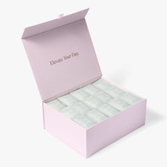 Open pink London Nootropics coffee box full of Mojo adaptogen coffee sachets