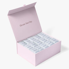 Open pink London Nootropics coffee box full of Mush Love adaptogen coffee sachets