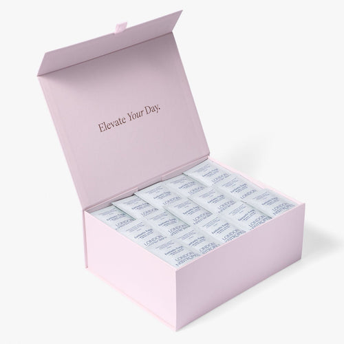 Open pink London Nootropics coffee box full of Mush Love adaptogen coffee sachets