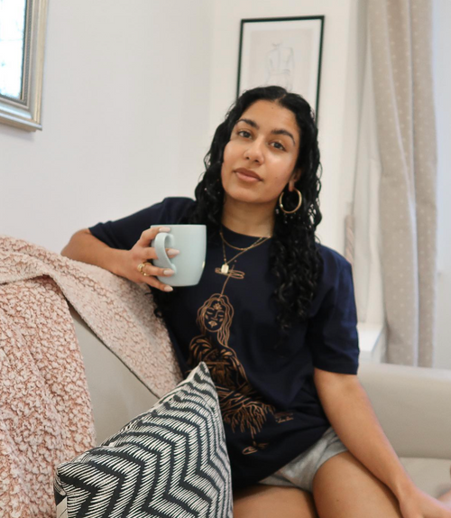 Woman enjoying a mug of mushroom nootropic coffee